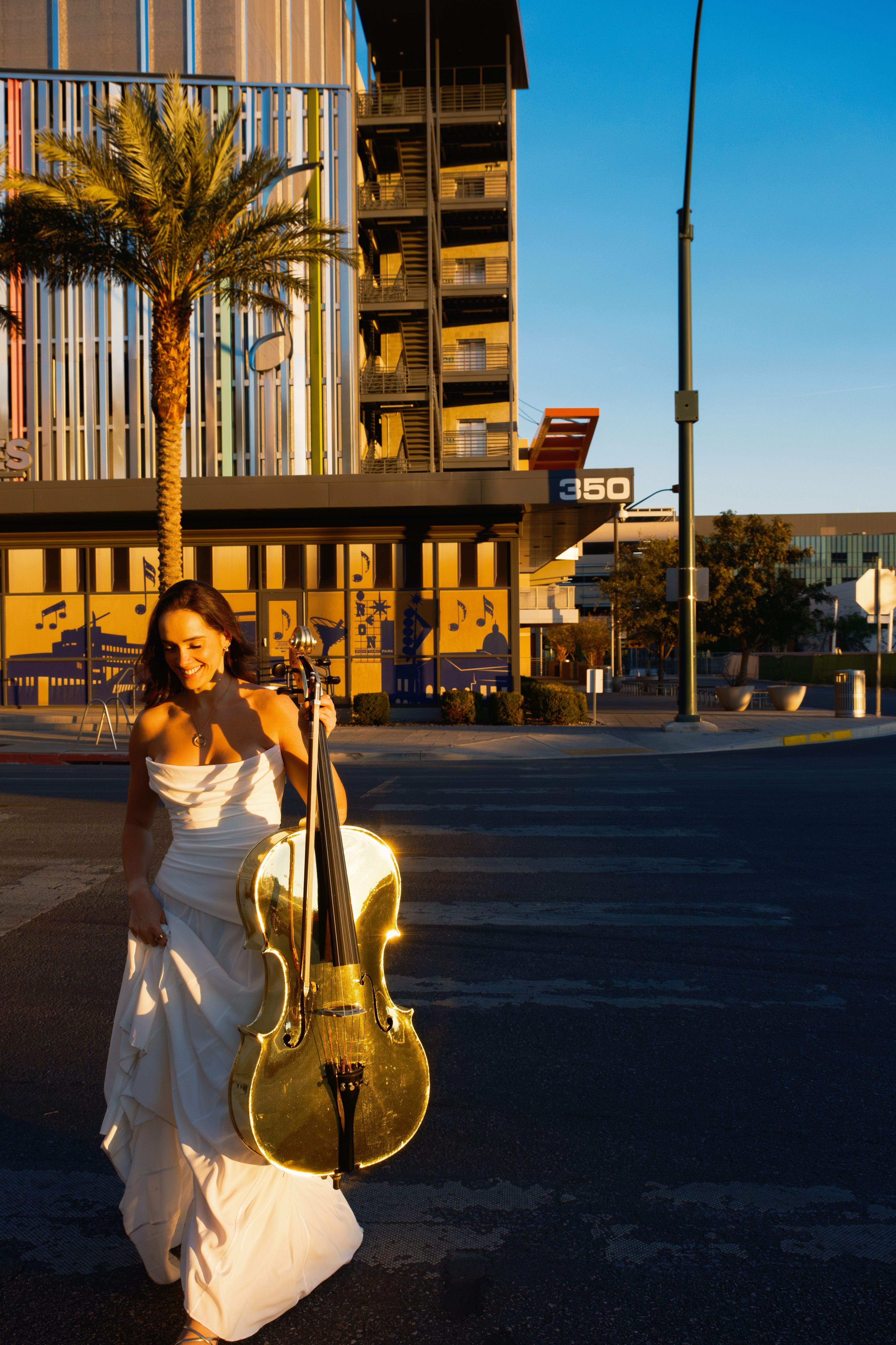 Golden hour urban performance in white dress